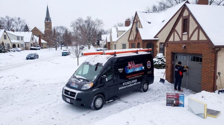 Tech installing garage door wintere with Best Garage Door Materials For Minneapolis Area