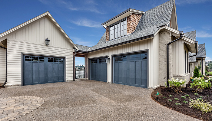 Modern Home With Three Garage Doors